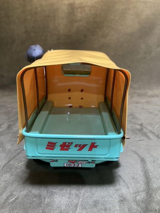 ブリキ　ダイハツ ミゼット DKA型　崑ちゃん人形箱付き　日本製 Amazon.co.jp: 大阪ブリキ ダイハツ•ミゼットDKA型 崑ちゃんソフビ人形